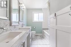 Updated double sink bath with make up mirror -