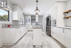 Updated kitchen with centre granite island -