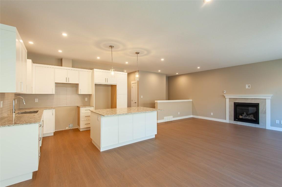 443 Poplar Drive, Logan Lake, BC - Indoor Photo Showing Kitchen With Fireplace With Upgraded Kitchen