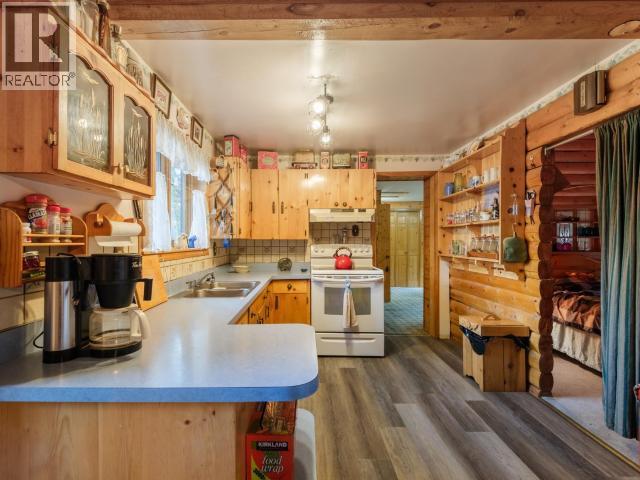 16 Deadend Road, Whitehorse South, YT - Indoor Photo Showing Kitchen With Double Sink