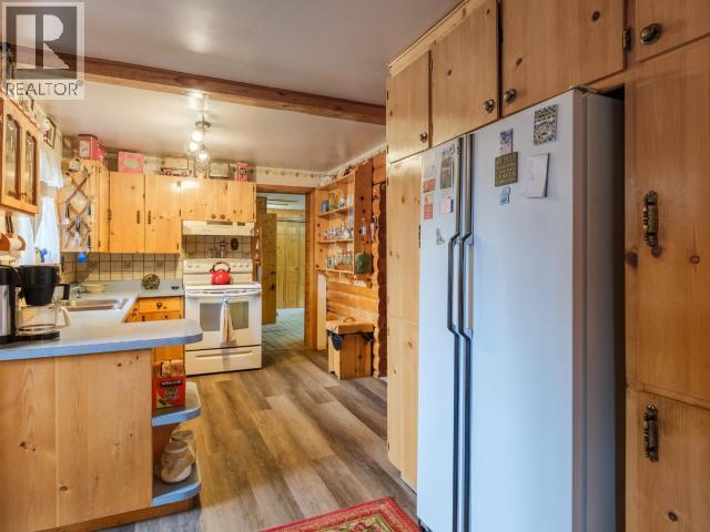16 Deadend Road, Whitehorse South, YT - Indoor Photo Showing Kitchen With Double Sink