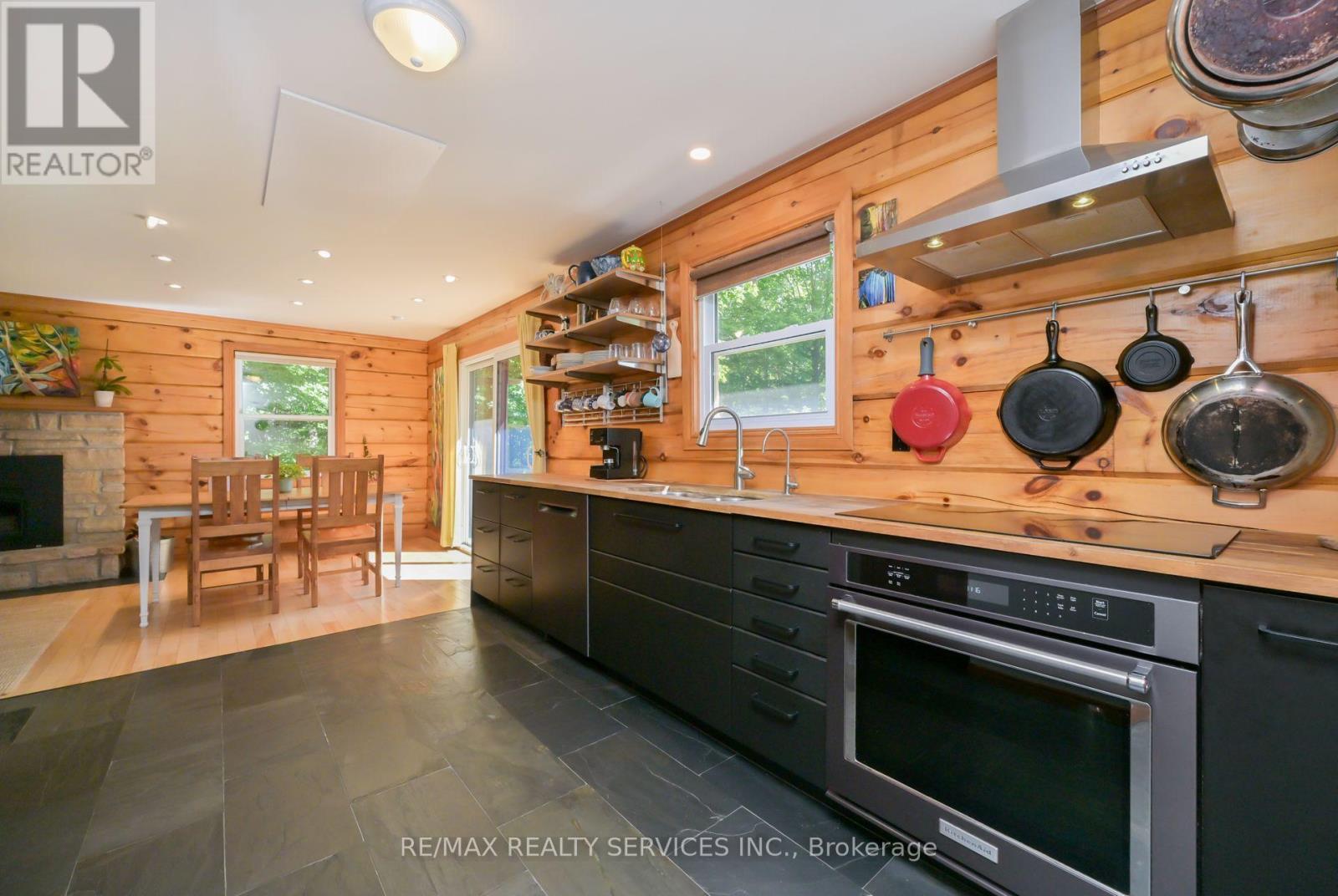 1 Mountainview Road, Mulmur, ON - Indoor Photo Showing Kitchen With Fireplace