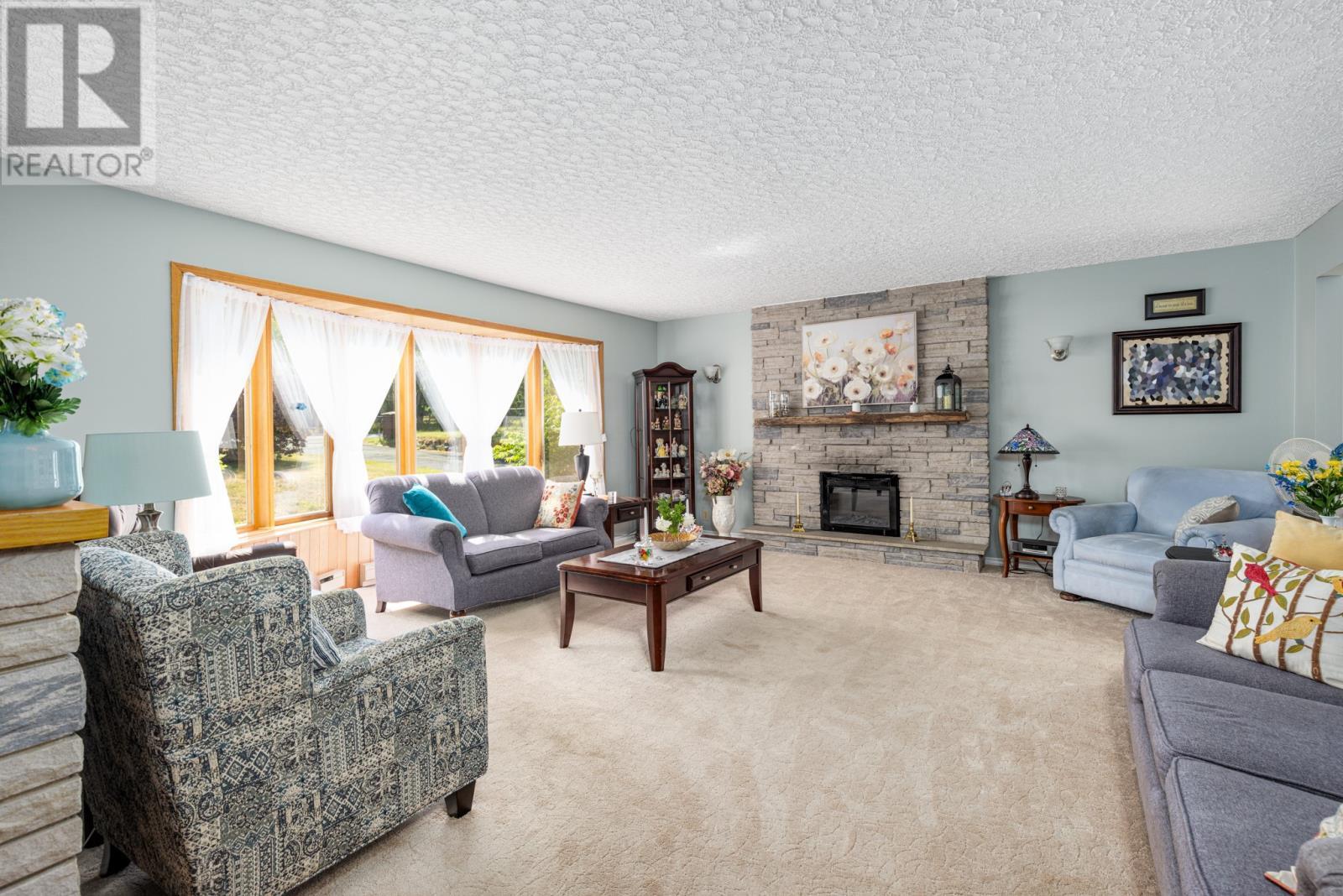 1470 Conception Bay Highway, Conception Bay South, NL - Indoor Photo Showing Living Room With Fireplace