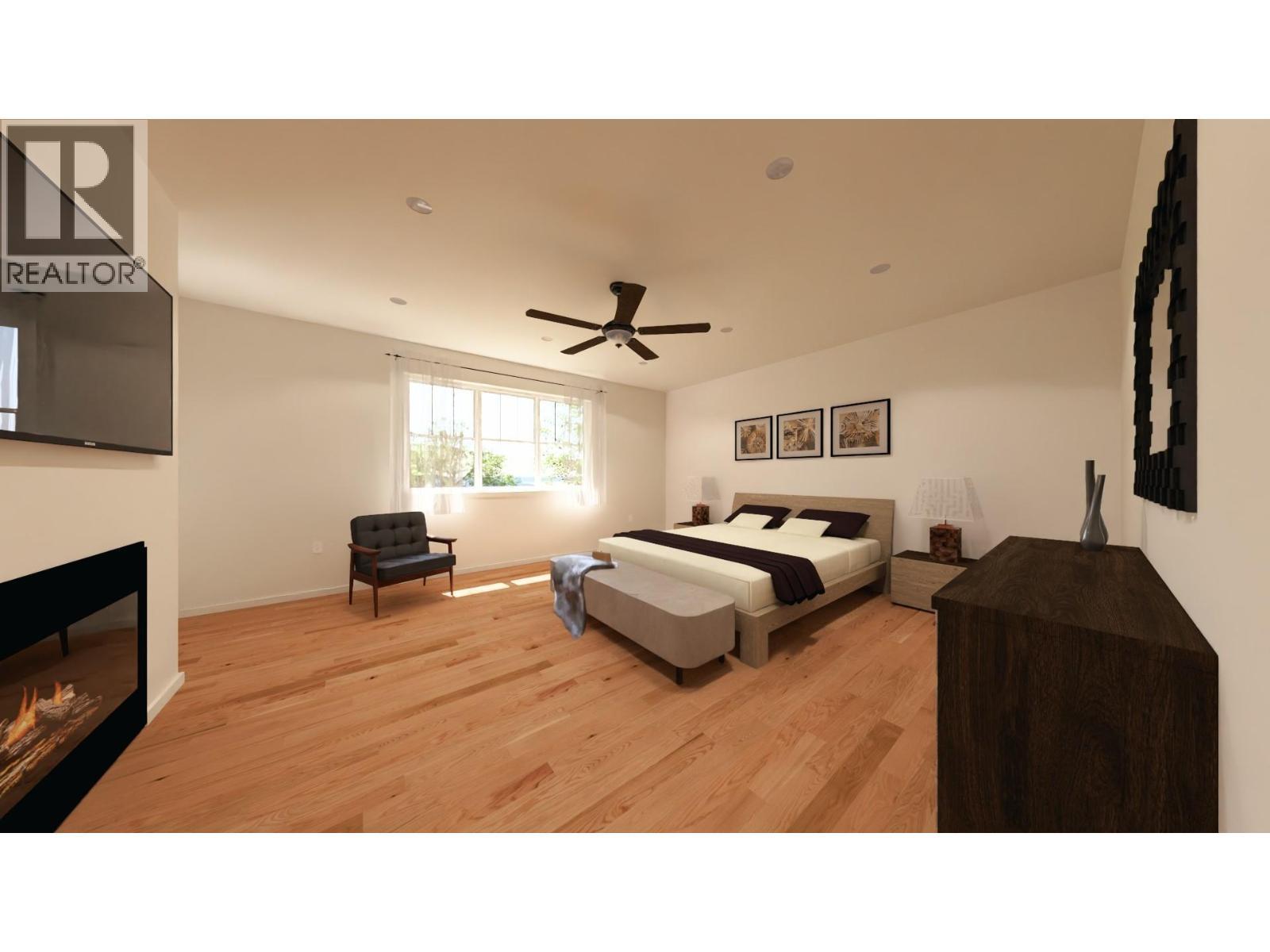 6609 Nixon Road Unit# 102, Summerland, BC - Indoor Photo Showing Bedroom With Fireplace