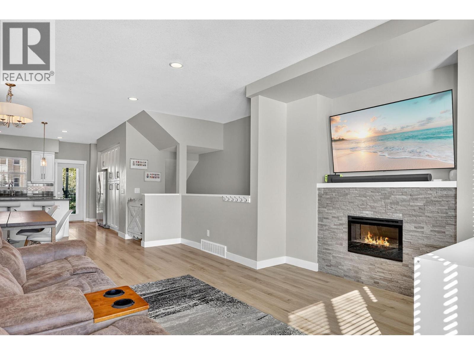 2490 Tuscany Drive Unit# 14, West Kelowna, BC - Indoor Photo Showing Living Room With Fireplace