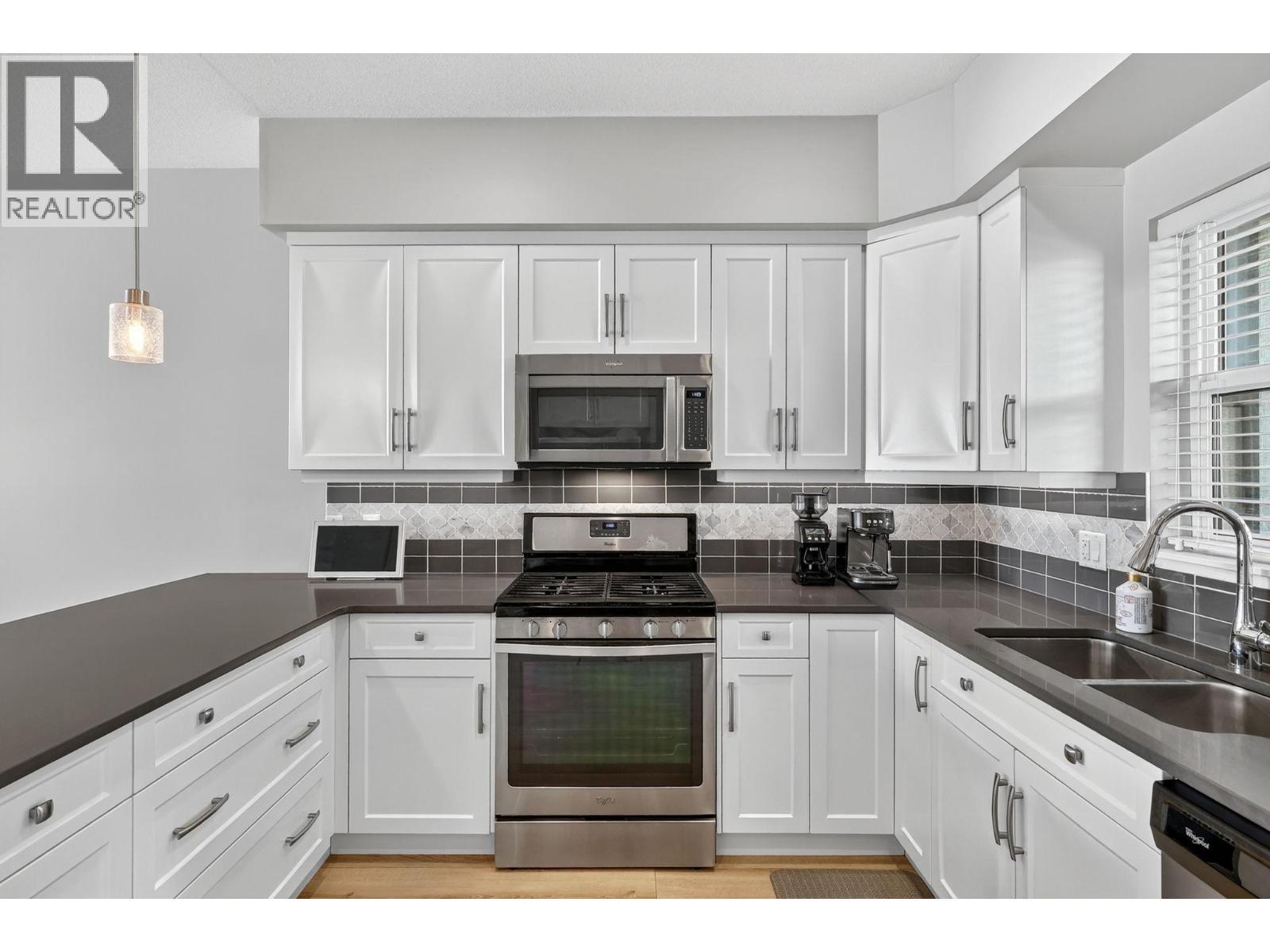 2490 Tuscany Drive Unit# 14, West Kelowna, BC - Indoor Photo Showing Kitchen With Double Sink