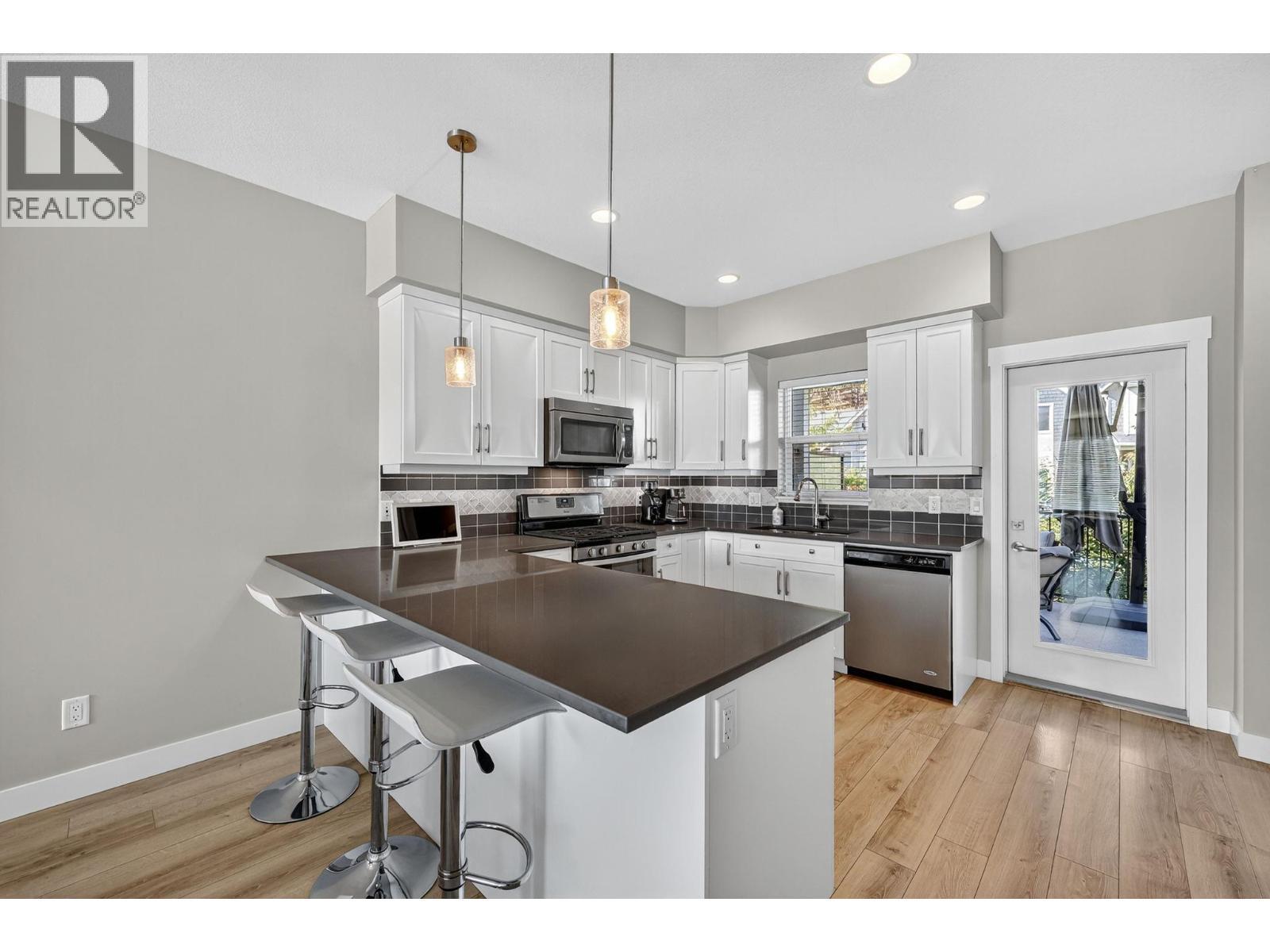 2490 Tuscany Drive Unit# 14, West Kelowna, BC - Indoor Photo Showing Kitchen With Stainless Steel Kitchen With Upgraded Kitchen