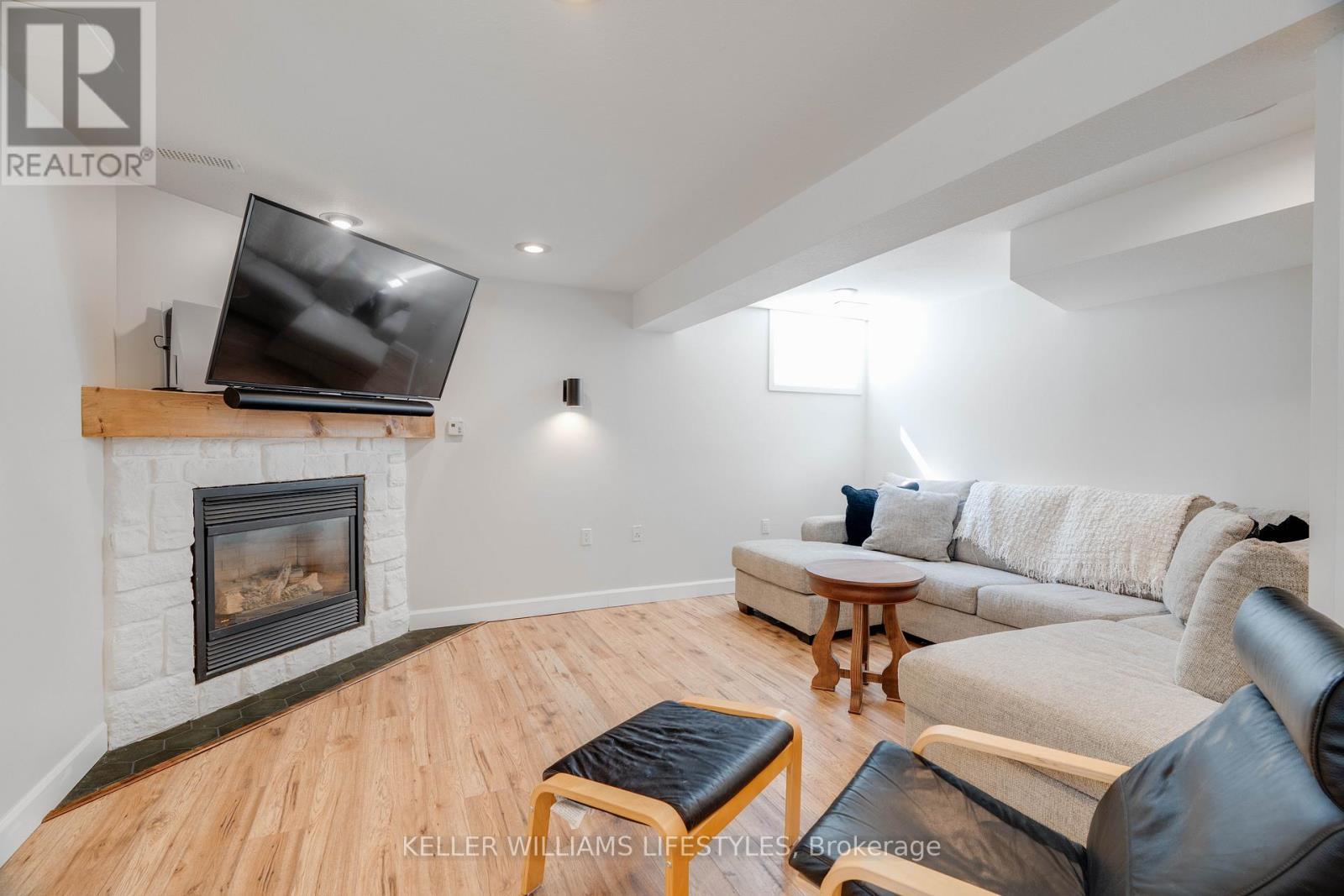 58 Deborah Drive, Strathroy-Caradoc (Ne), ON - Indoor Photo Showing Living Room With Fireplace