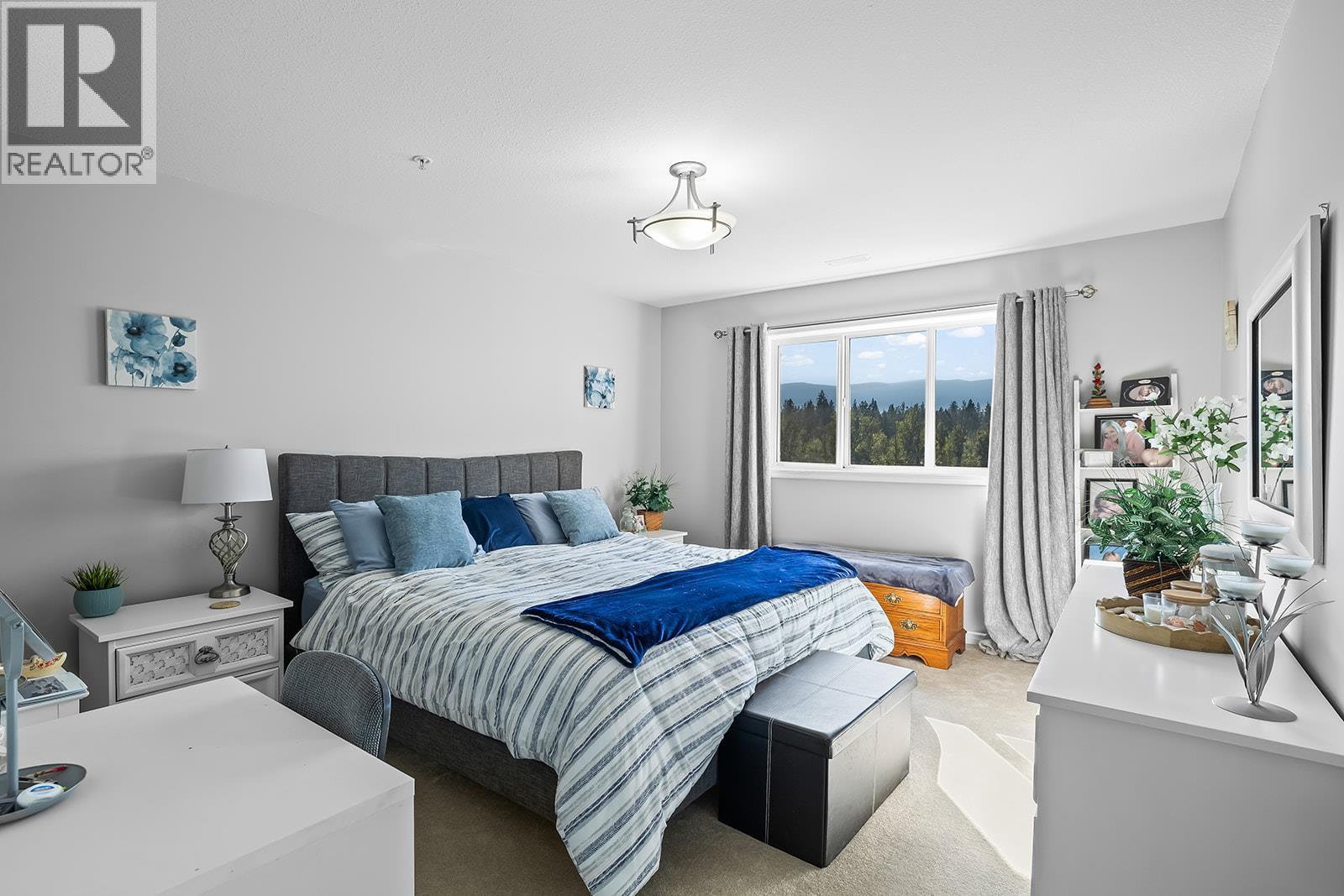 1967 Underhill Street Unit# 704, Kelowna, BC - Indoor Photo Showing Bedroom