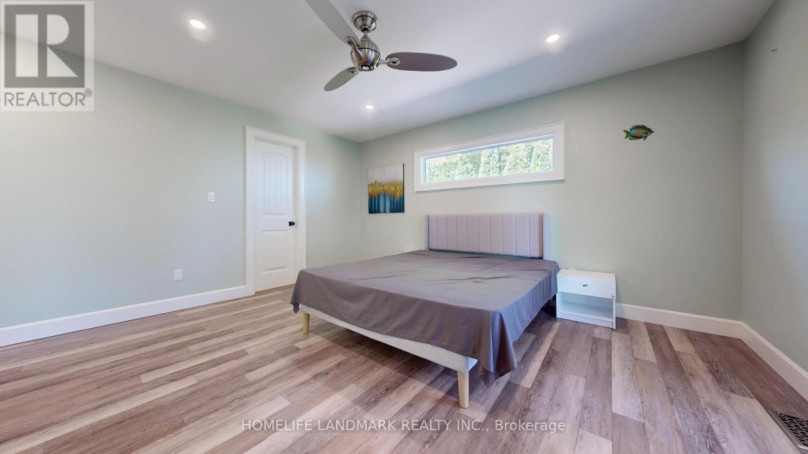 208 Lakeshore Drive, Kawartha Lakes, ON - Indoor Photo Showing Bedroom