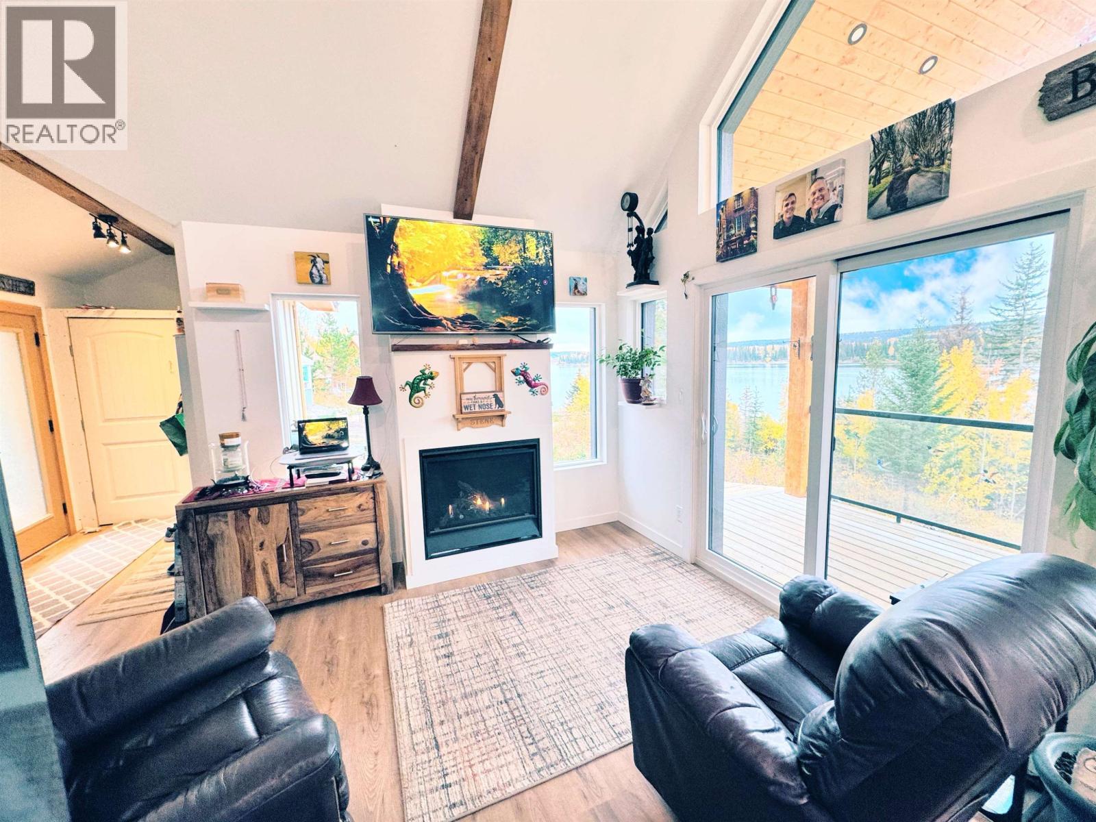 6656 North Shore Horse Lake Road, Horse Lake, BC - Indoor Photo Showing Other Room With Fireplace