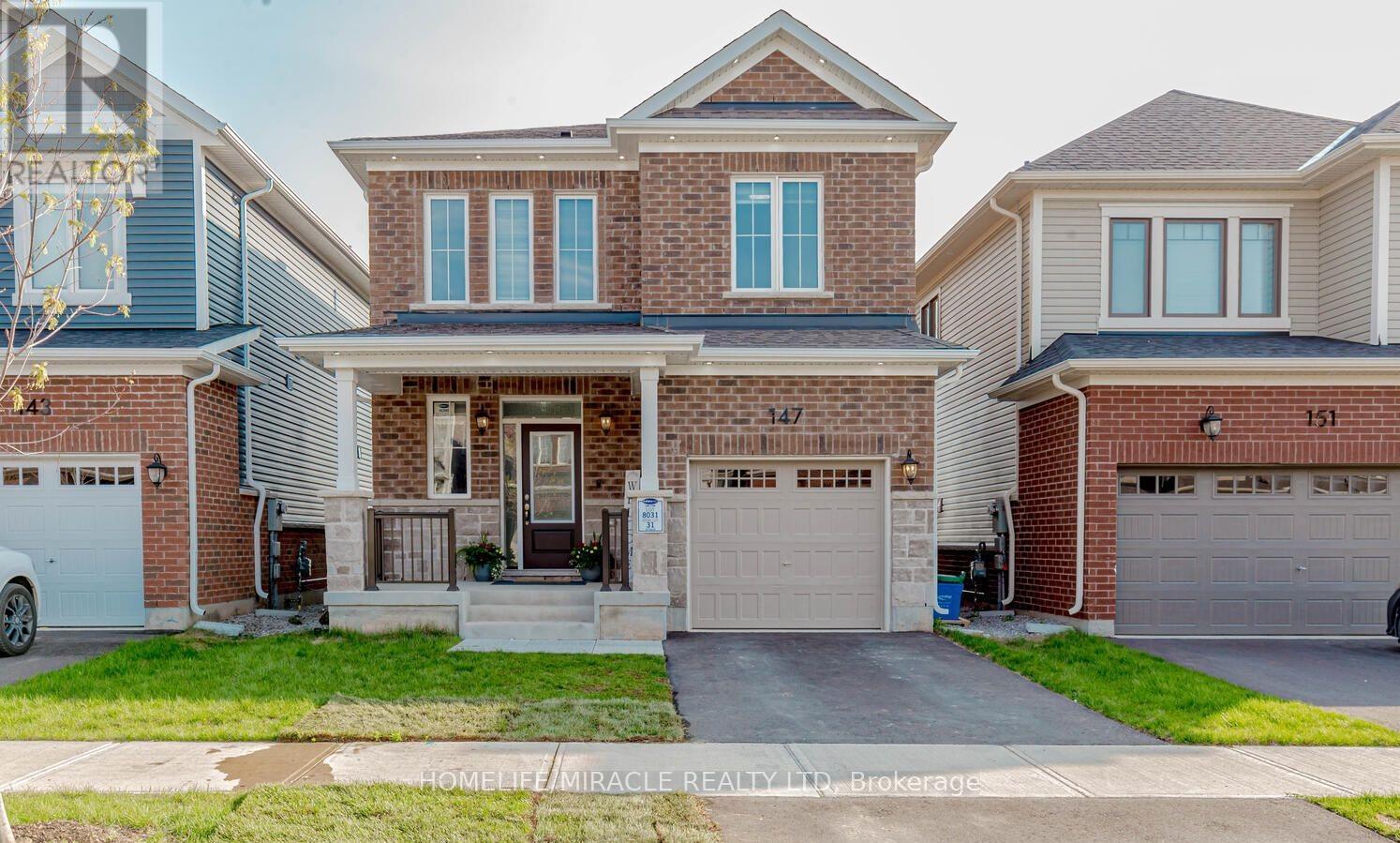 147 Yates Drive, Milton, ON - Outdoor With Facade