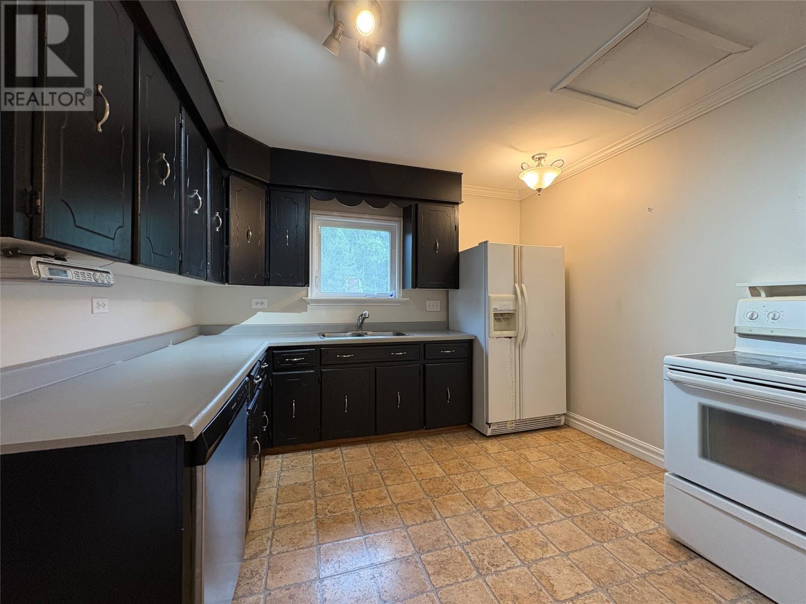 72 Main Street, Brown'S Arm, NL - Indoor Photo Showing Kitchen With Double Sink