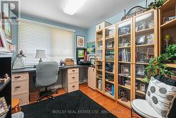 Bright Office with Built-in Bookcase -
