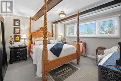 Lower Level Bedroom with Large Windows -