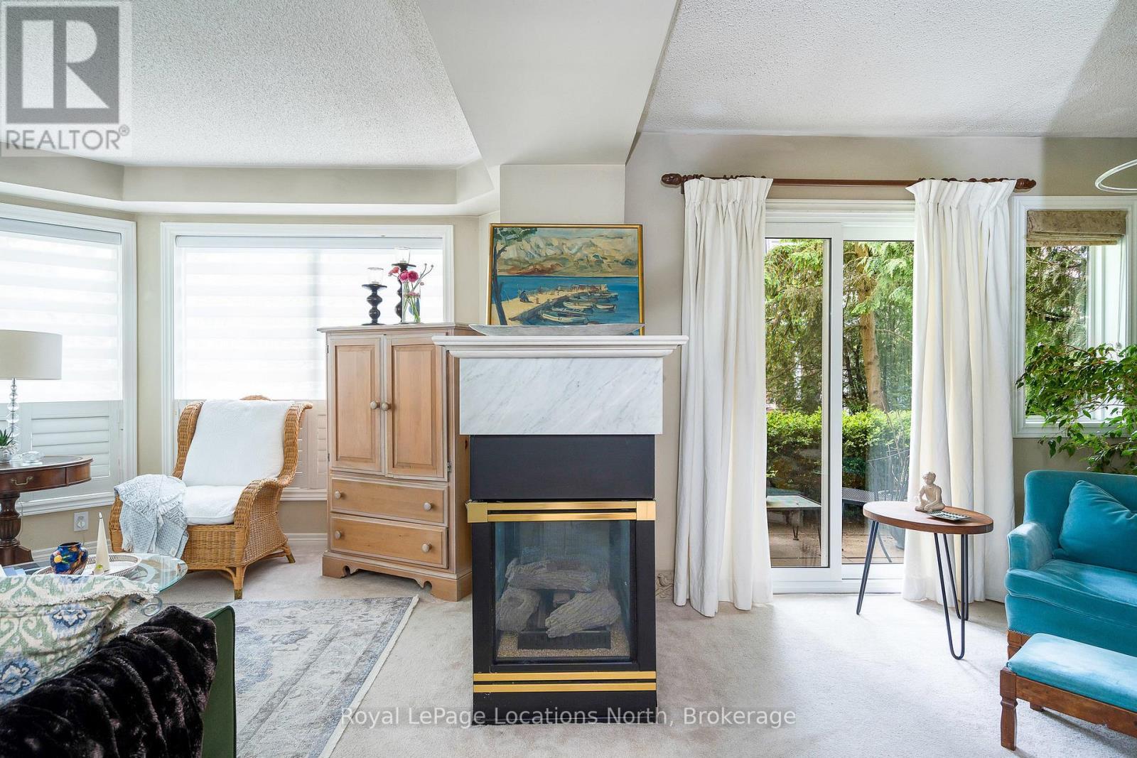 166 Fairway Crescent, Collingwood, ON - Indoor Photo Showing Living Room With Fireplace