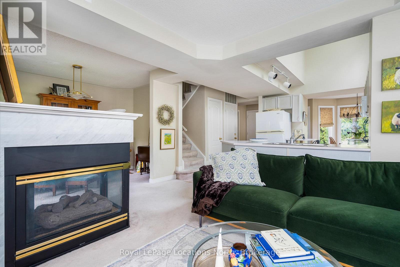 166 Fairway Crescent, Collingwood, ON - Indoor Photo Showing Living Room With Fireplace