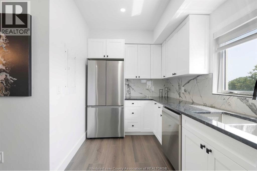755 Grand Marais Unit# 102, Windsor, ON - Indoor Photo Showing Kitchen With Double Sink