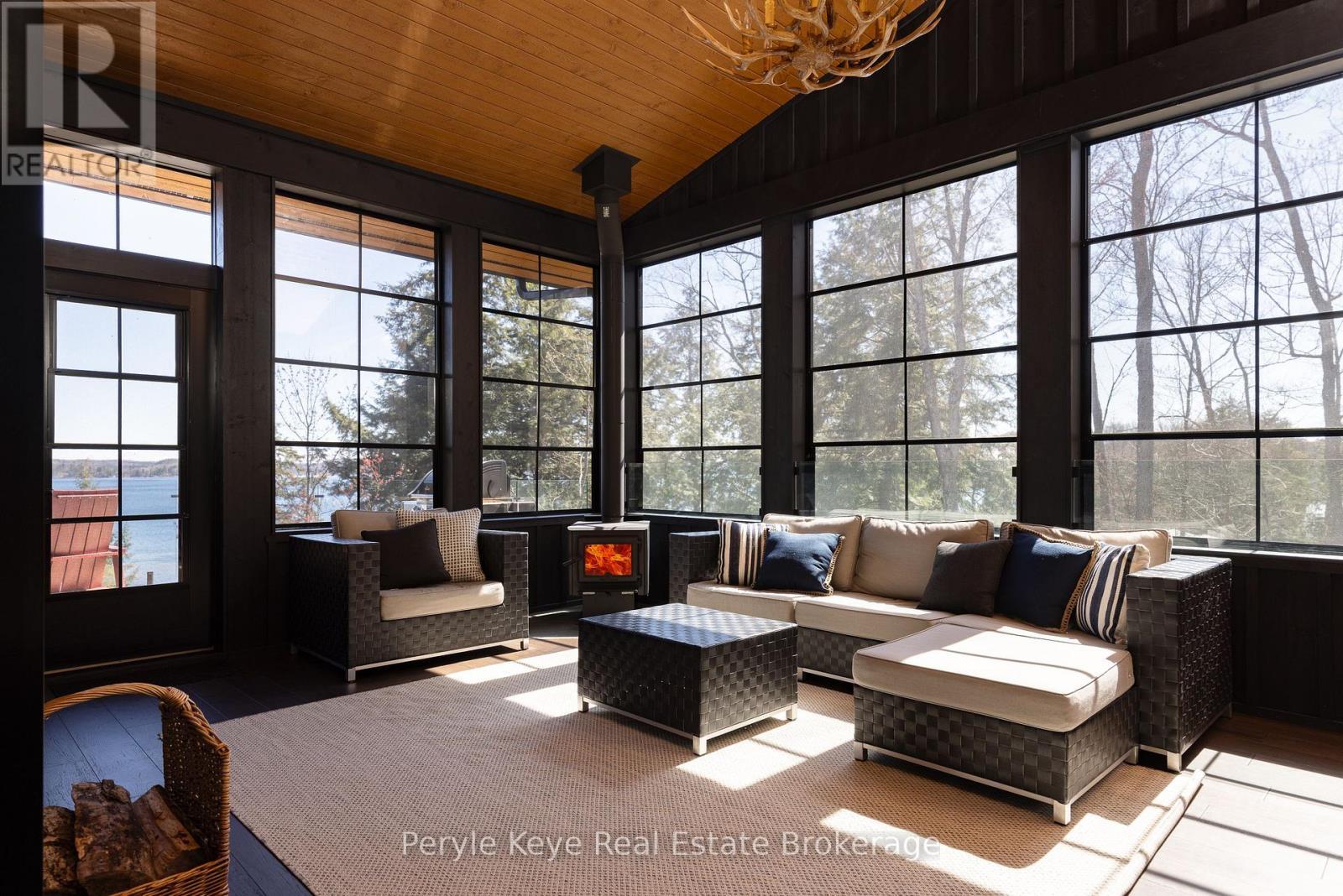 Muskoka Room with a Cozy Woodstove - 86 Claren Crescent, Huntsville (Stisted), ON - Indoor Photo Showing Other Room
