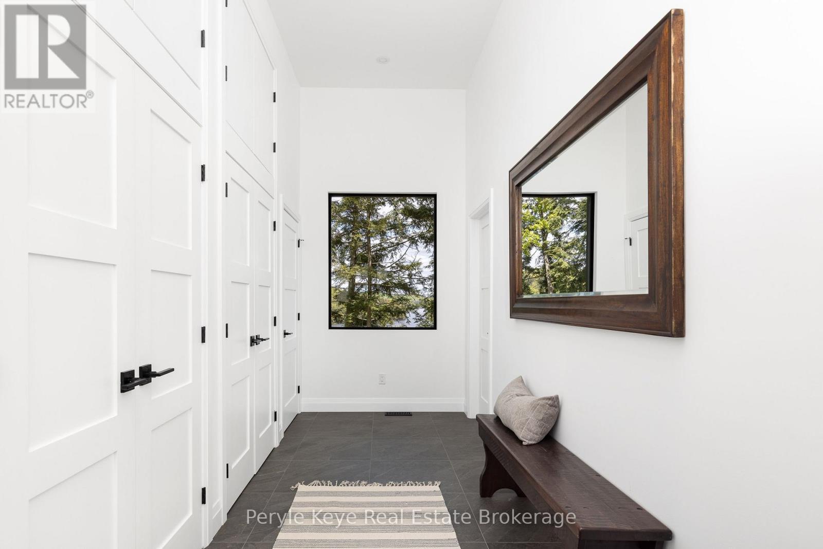 Hallway w/ Storage Leading to Laundry Room - 86 Claren Crescent, Huntsville (Stisted), ON - Indoor Photo Showing Other Room