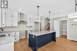 Tall cabinets, plenty of drawers, walk-in pantry -