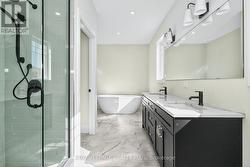 Soaker Tub, Glass Shower, 2 sinks -