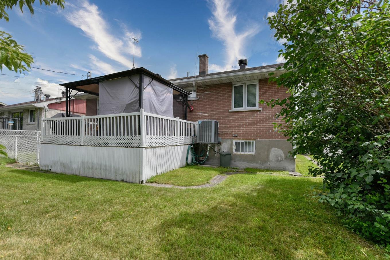 Back facade - 875 Av. Devonshire, Laval (Chomedey), QC - Outdoor With Exterior