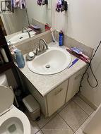 Pewter Faucets and Cabinet with Doors -