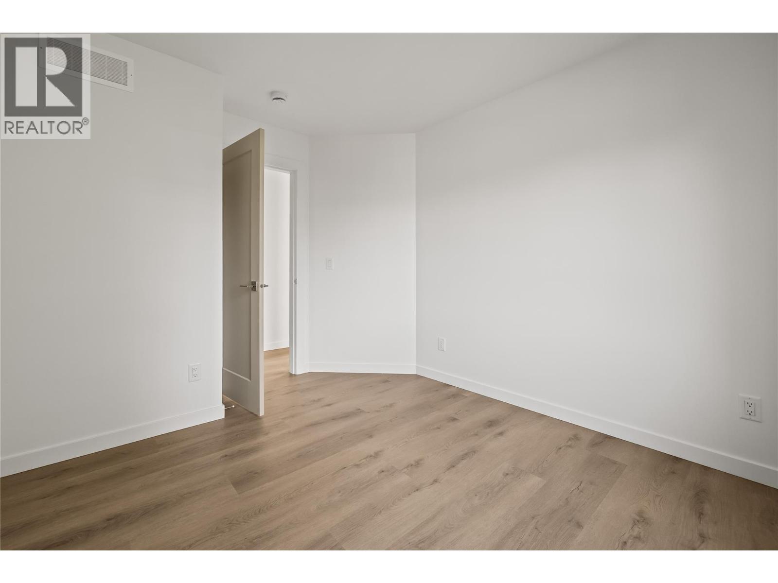 Second Bedroom - 2957 Conlin Court Unit# 1, Kelowna, BC - Indoor Photo Showing Other Room