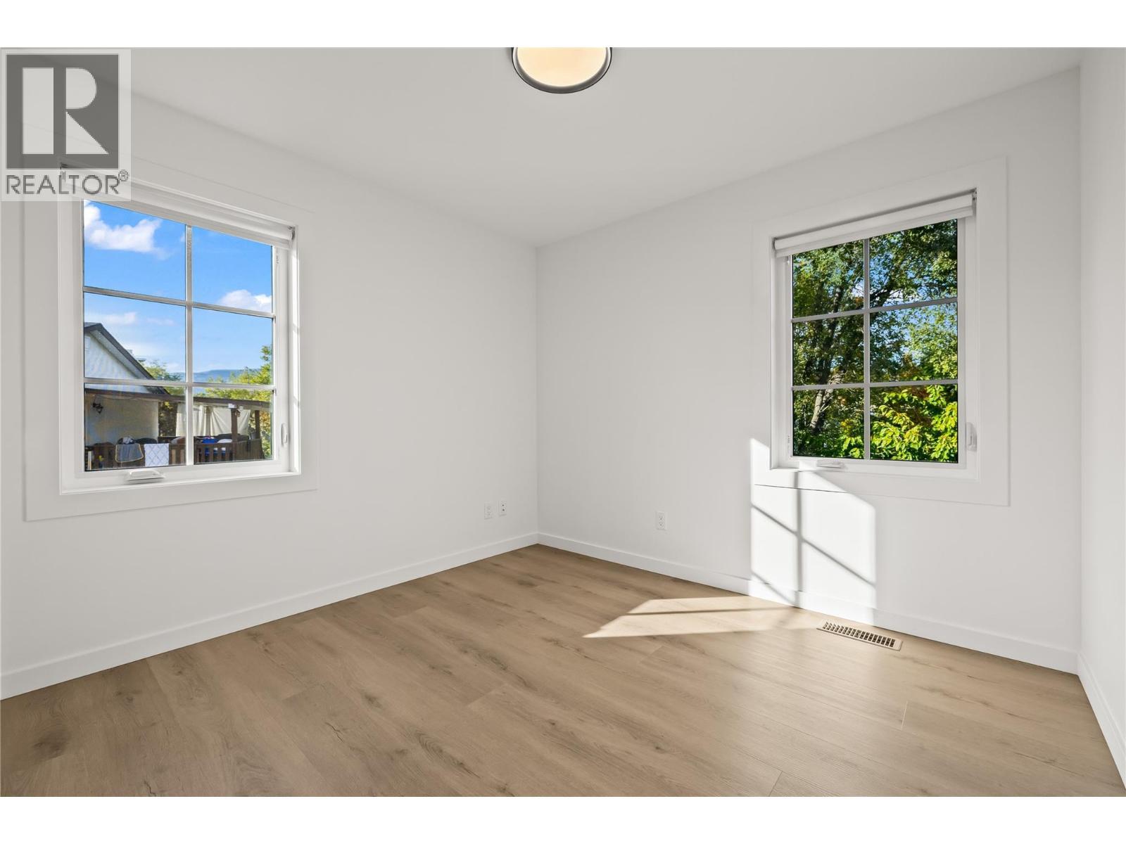 Third Bedroom - 2957 Conlin Court Unit# 1, Kelowna, BC - Indoor Photo Showing Other Room