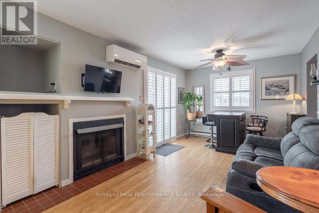 E - 3066 Councillors Way, Ottawa, ON - Indoor Photo Showing Living Room With Fireplace