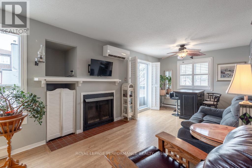 E - 3066 Councillors Way, Ottawa, ON - Indoor Photo Showing Living Room With Fireplace