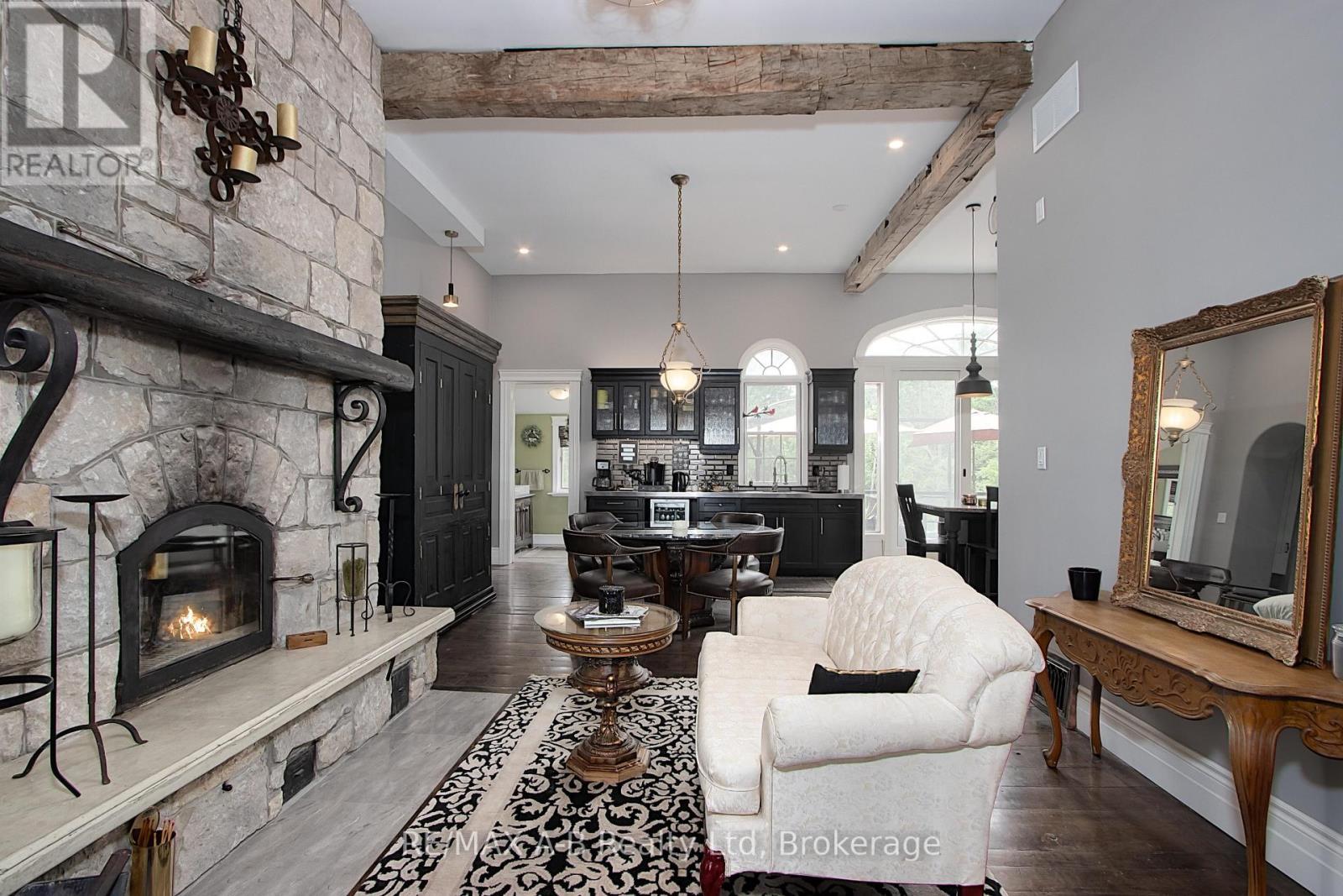 12096 Gale Road, North Middlesex (Carlisle), ON - Indoor Photo Showing Living Room With Fireplace