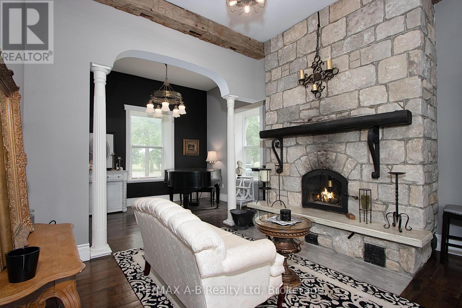 12096 Gale Road, North Middlesex (Carlisle), ON - Indoor Photo Showing Living Room With Fireplace