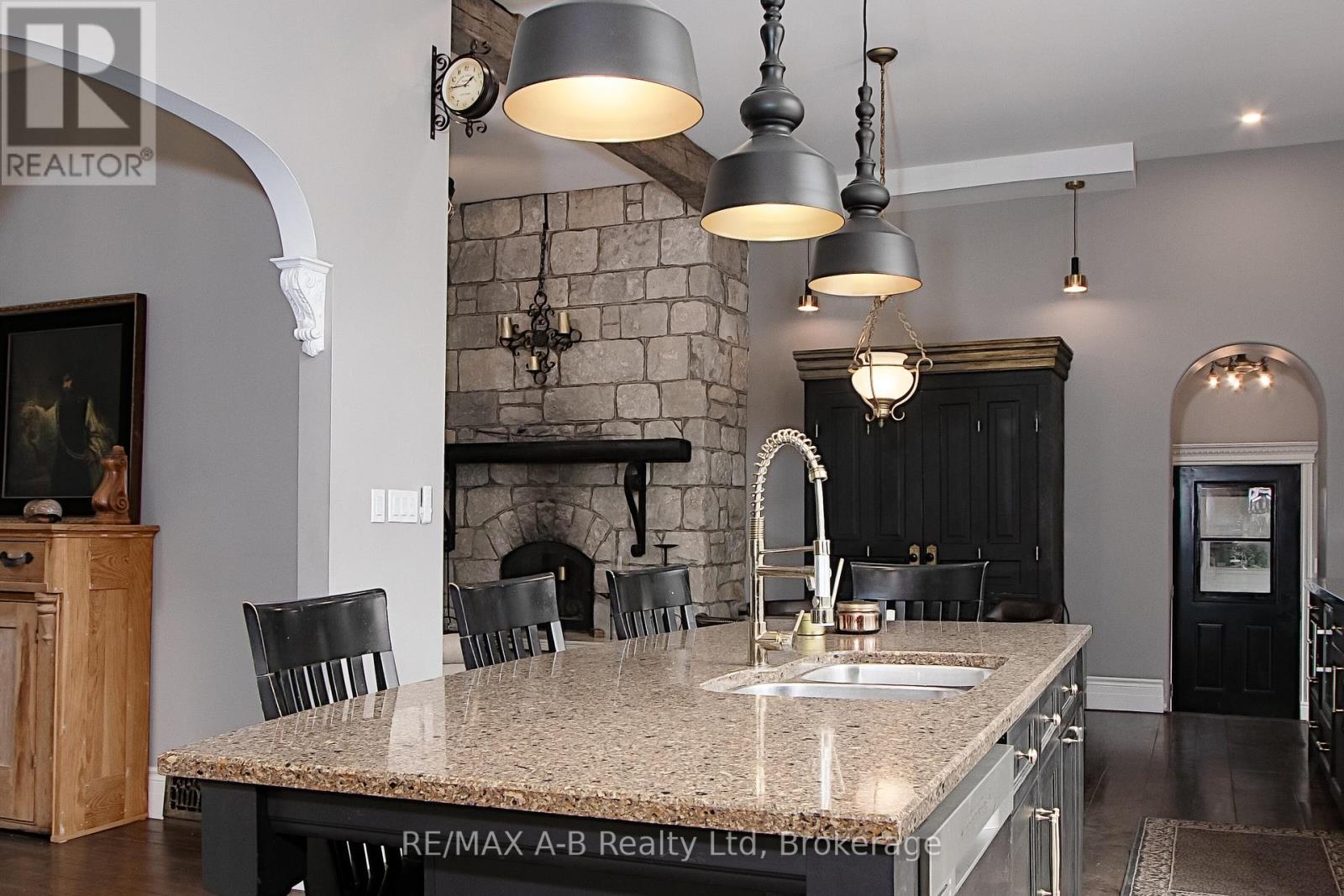 12096 Gale Road, North Middlesex (Carlisle), ON - Indoor With Fireplace