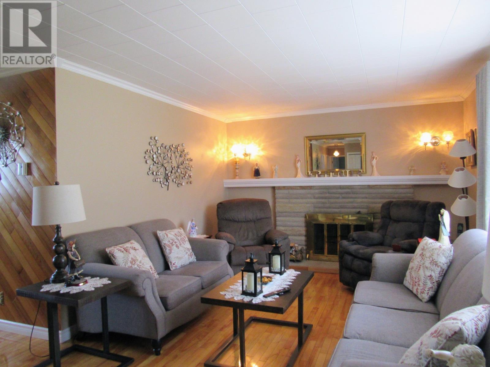 31 Hillcrest Road, Corner Brook, NL - Indoor Photo Showing Living Room With Fireplace