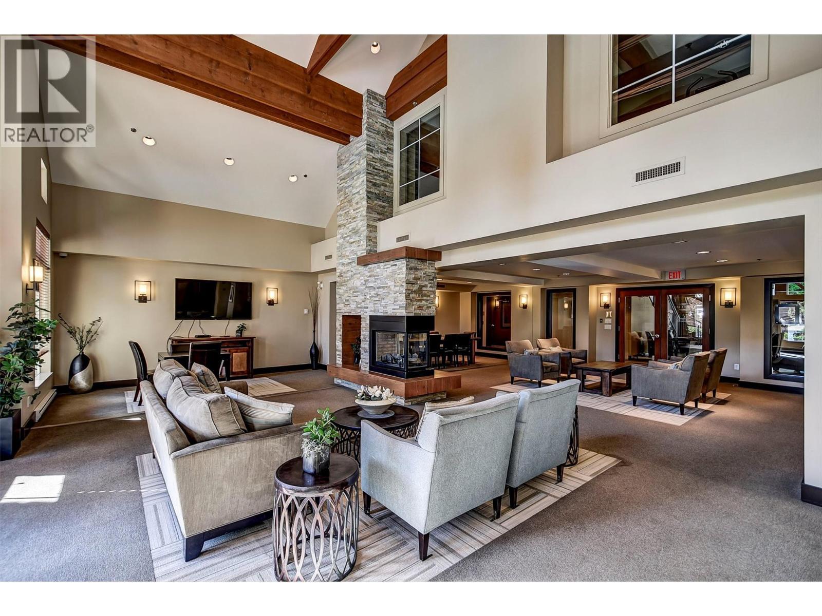 1075 Sunset Drive Unit# 2408, Kelowna, BC - Indoor With Fireplace