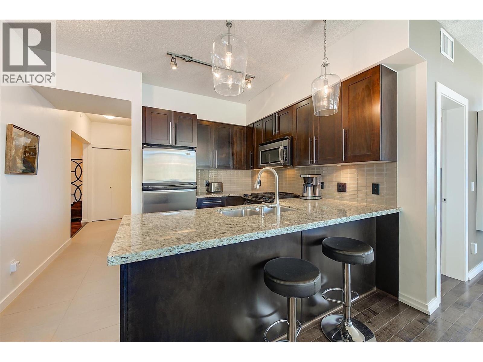 1075 Sunset Drive Unit# 2408, Kelowna, BC - Indoor Photo Showing Kitchen With Double Sink With Upgraded Kitchen
