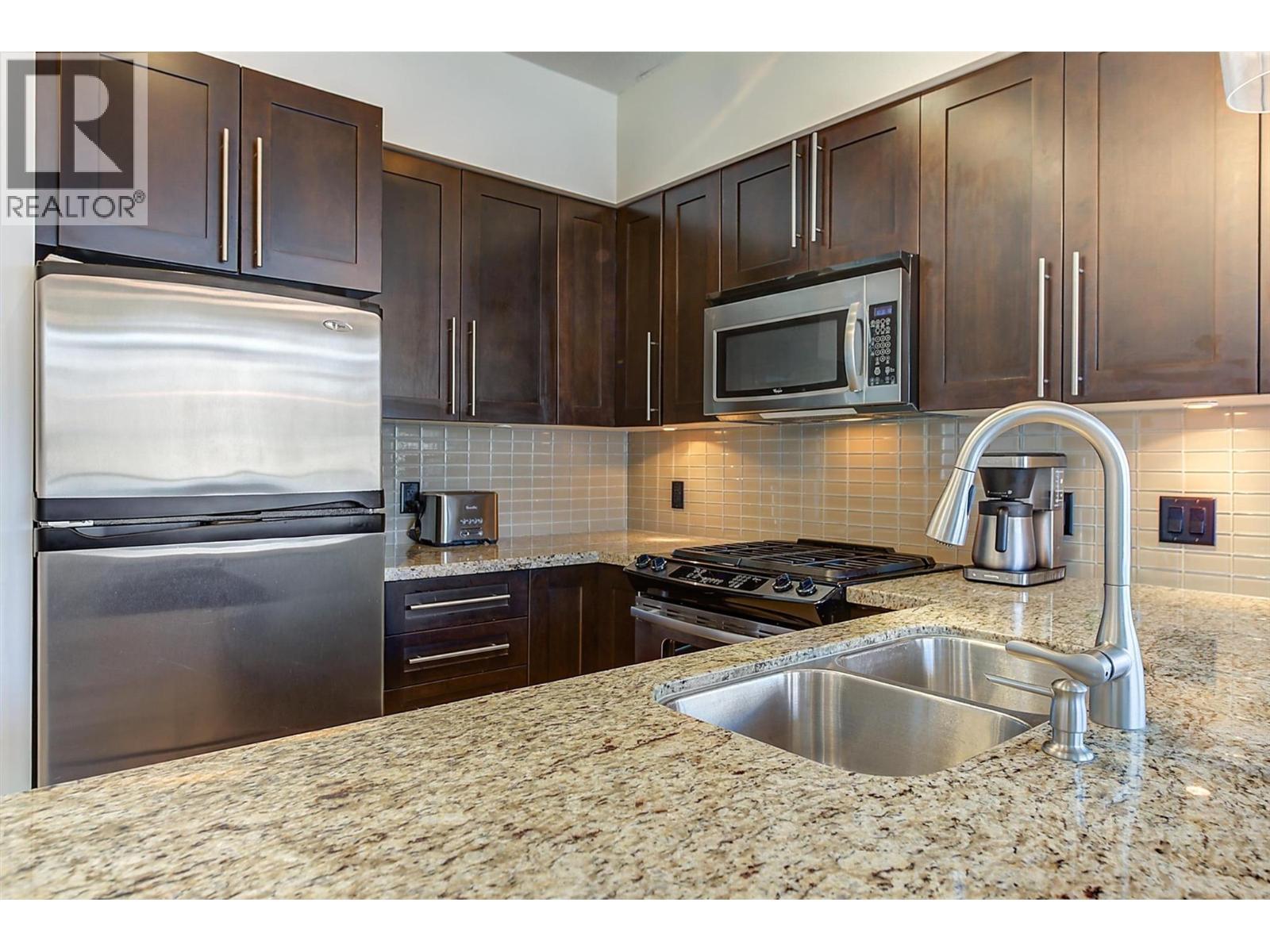 1075 Sunset Drive Unit# 2408, Kelowna, BC - Indoor Photo Showing Kitchen With Double Sink With Upgraded Kitchen