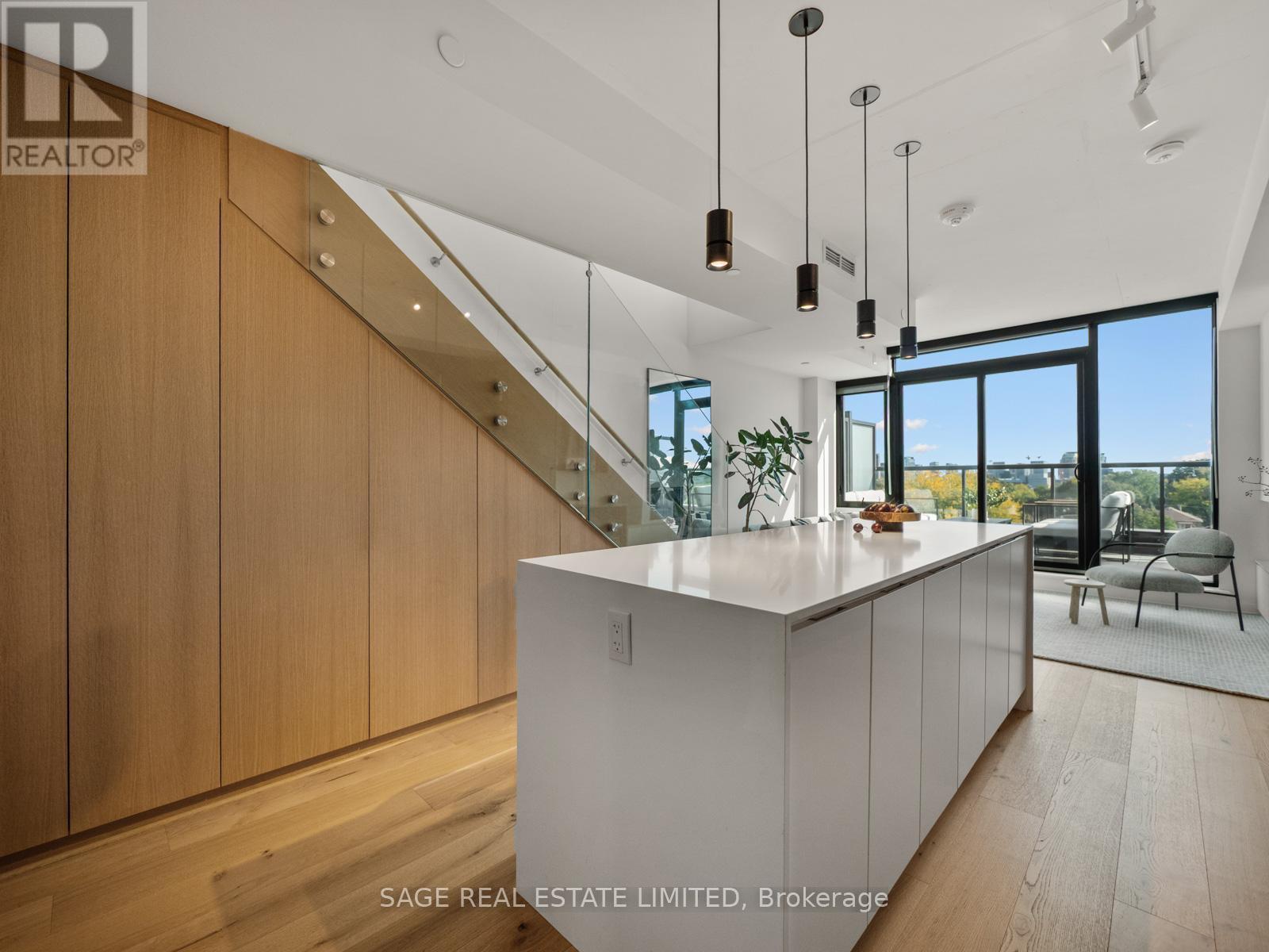 Lots of storage under stairs - Ph 621 - 899 College Street W, Toronto, ON - Indoor Photo Showing Kitchen