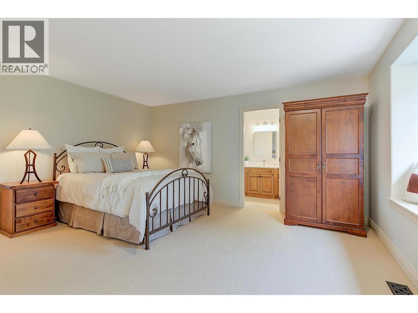 3875 Gallaghers Parkway, Kelowna, BC - Indoor Photo Showing Bedroom