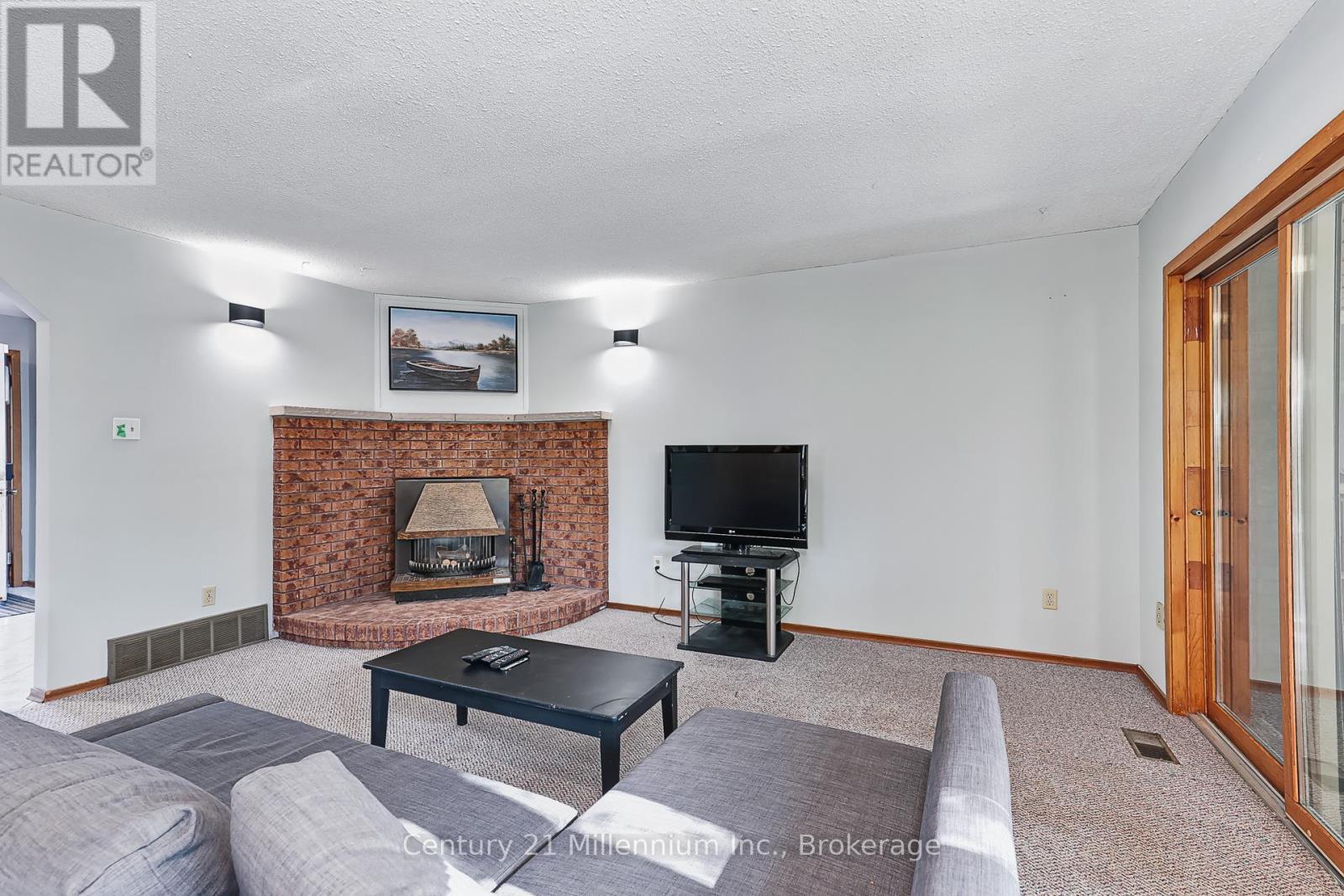 213 Jane Street, Clearview (Stayner), ON - Indoor Photo Showing Living Room With Fireplace