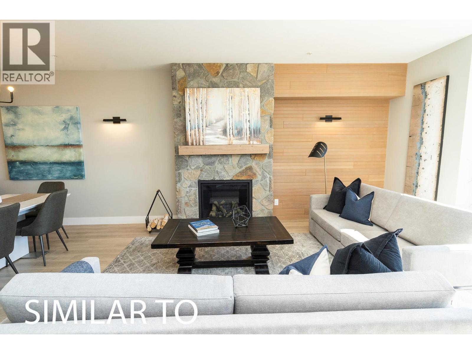 280B Grizzly Ridge Trail, Big White, BC - Indoor Photo Showing Living Room With Fireplace