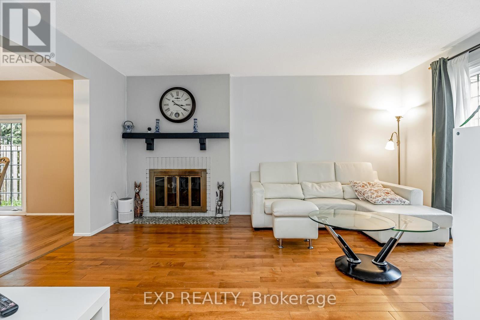 65 - 1029 Meadowlands Drive, Ottawa, ON - Indoor Photo Showing Living Room With Fireplace