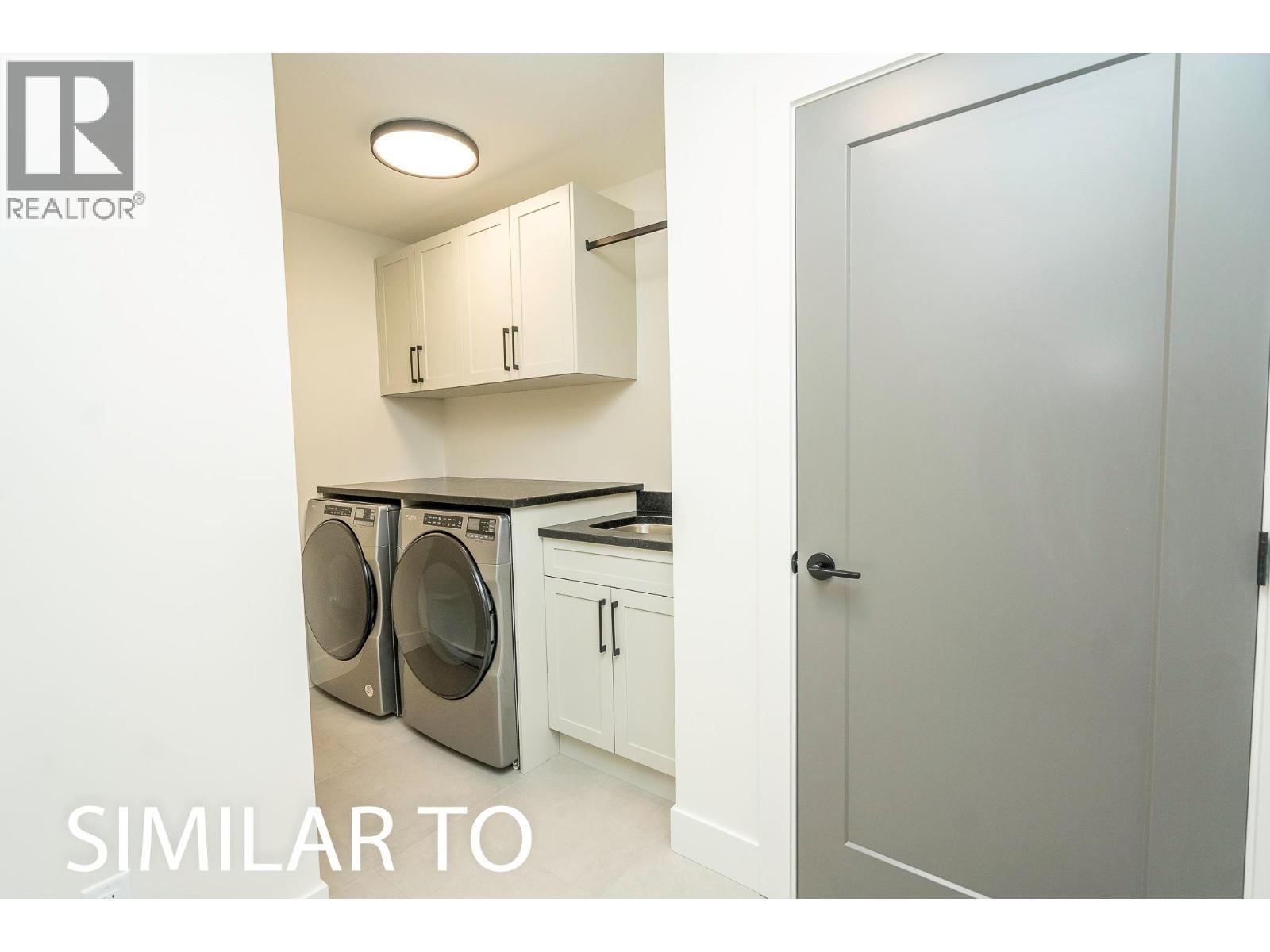 215B Grizzly Ridge Trail, Big White, BC - Indoor Photo Showing Laundry Room