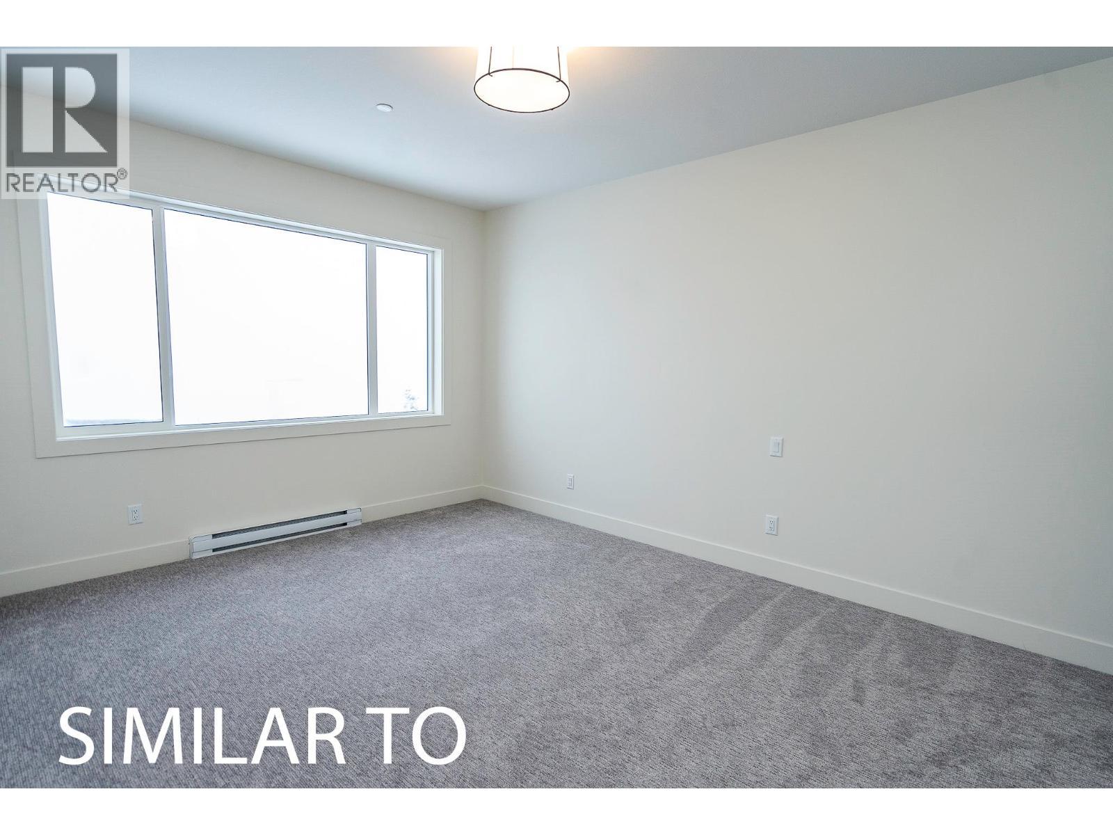 215B Grizzly Ridge Trail, Big White, BC - Indoor Photo Showing Other Room