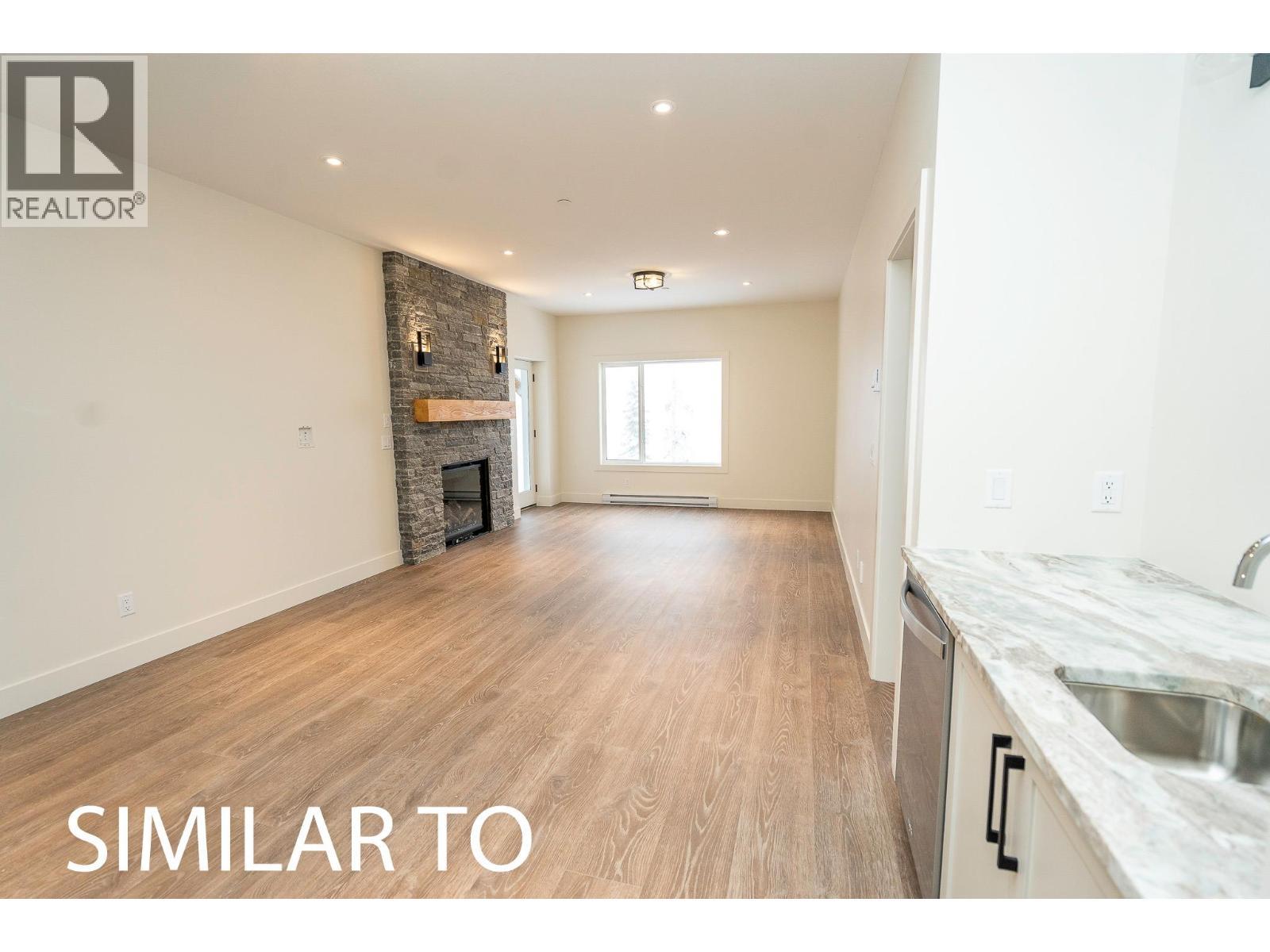 215B Grizzly Ridge Trail, Big White, BC - Indoor With Fireplace