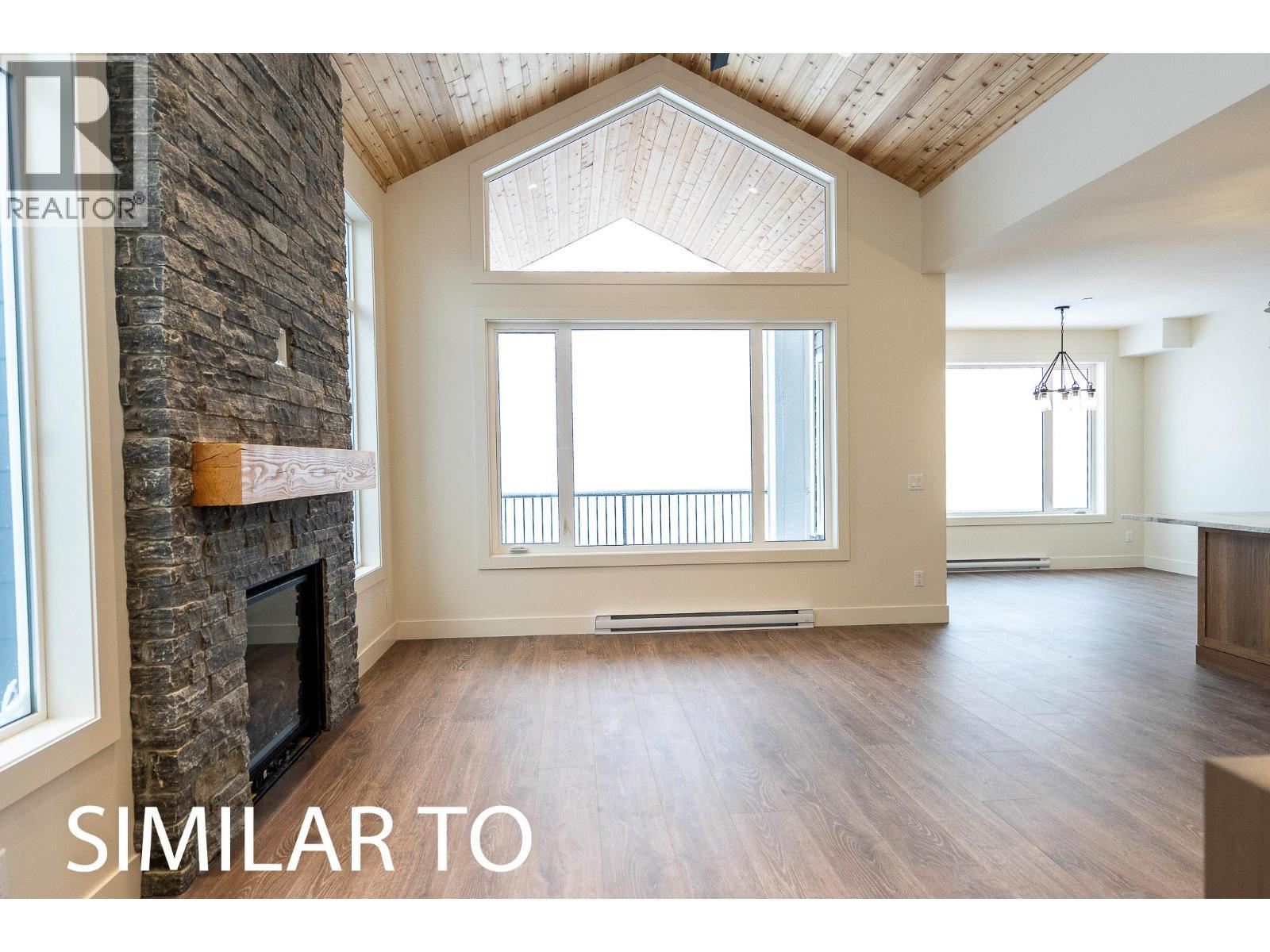 215B Grizzly Ridge Trail, Big White, BC - Indoor With Fireplace