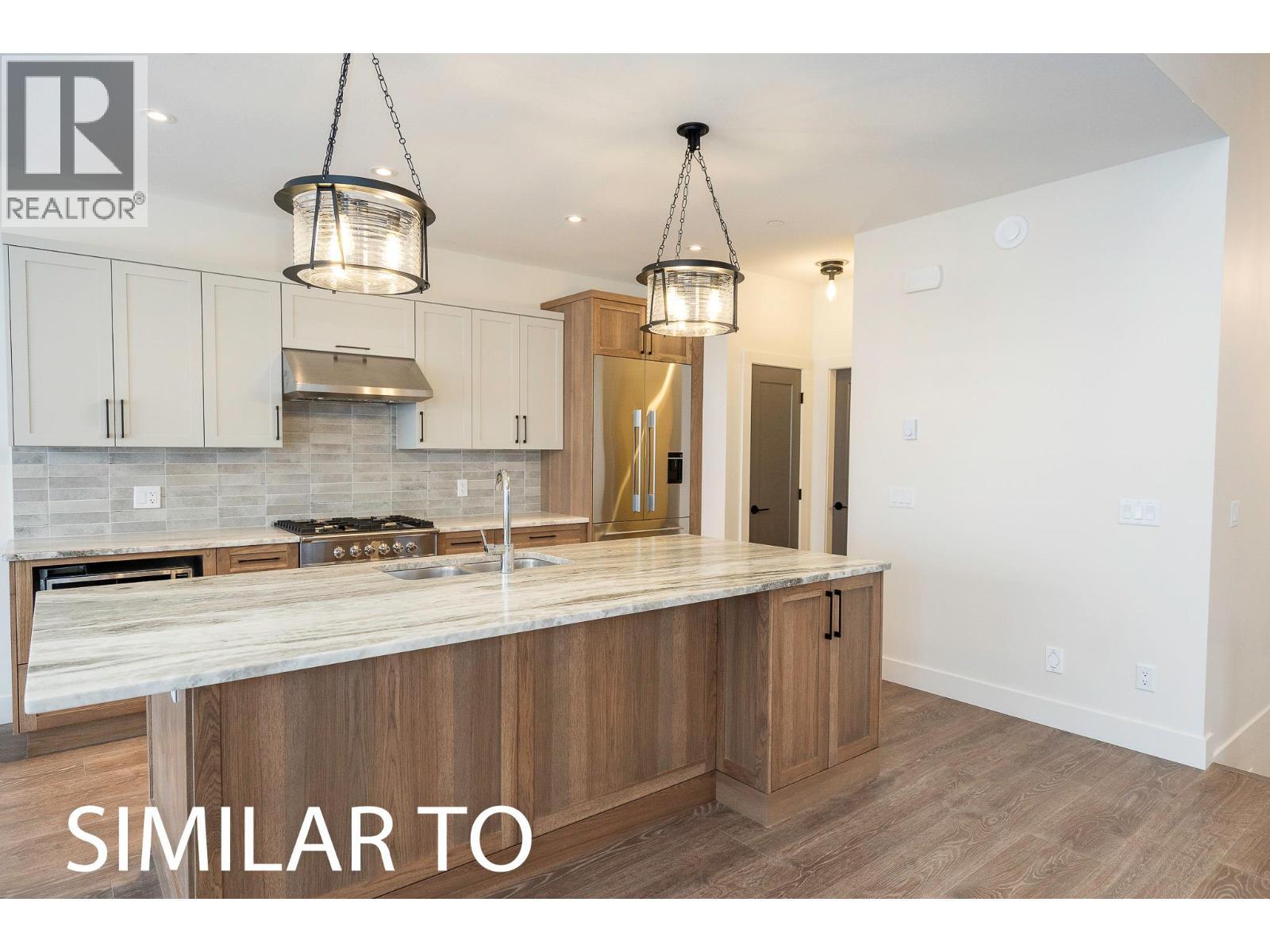 215B Grizzly Ridge Trail, Big White, BC - Indoor Photo Showing Kitchen With Upgraded Kitchen