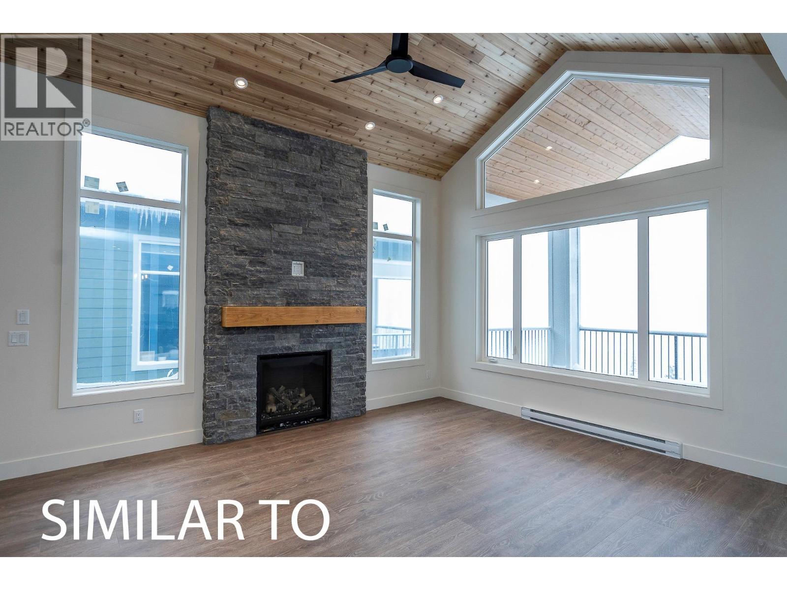 215B Grizzly Ridge Trail, Big White, BC - Indoor With Fireplace